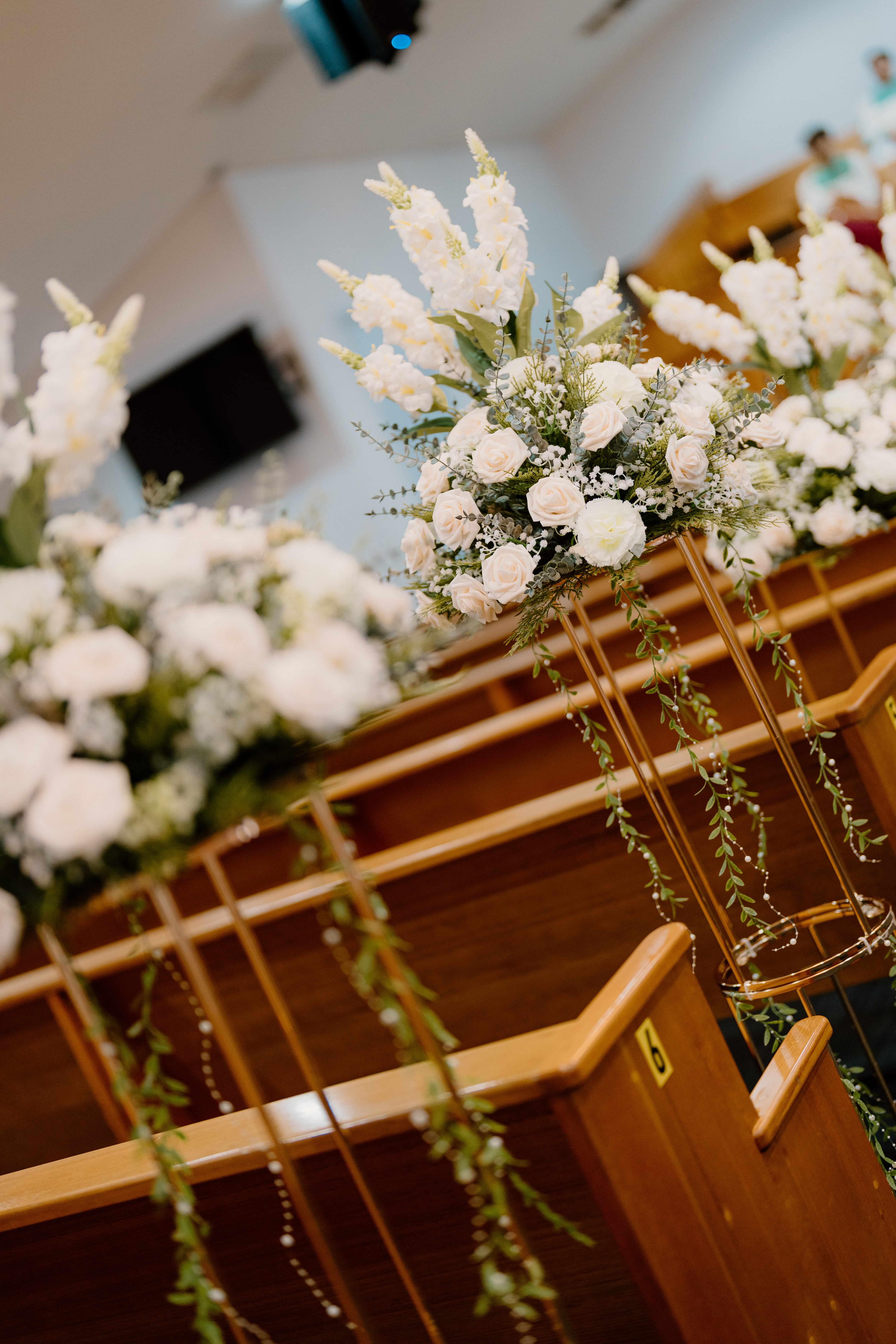 Placeholder for wedding ceremony floral arrangements