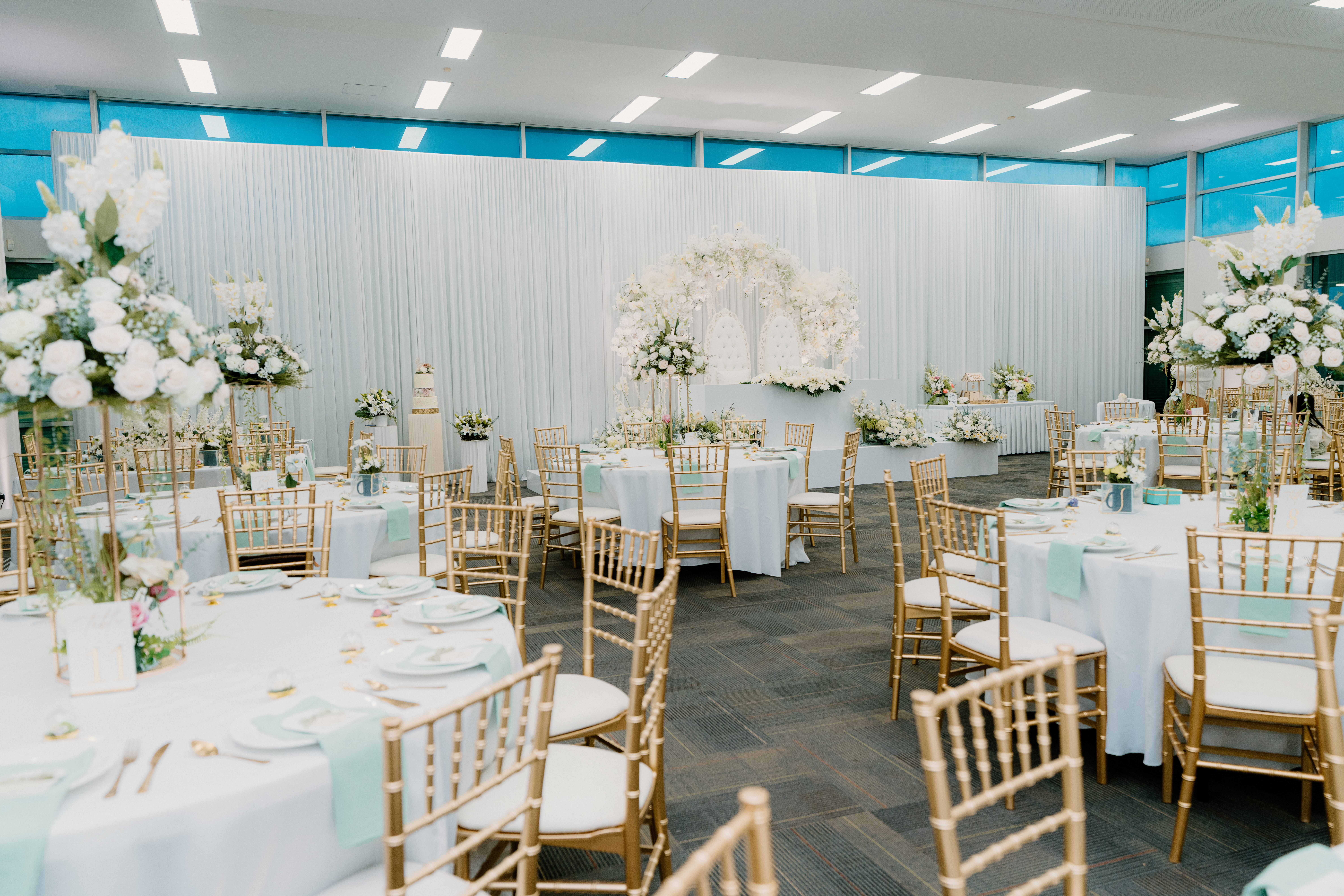 Placeholder for reception table floral centrepieces